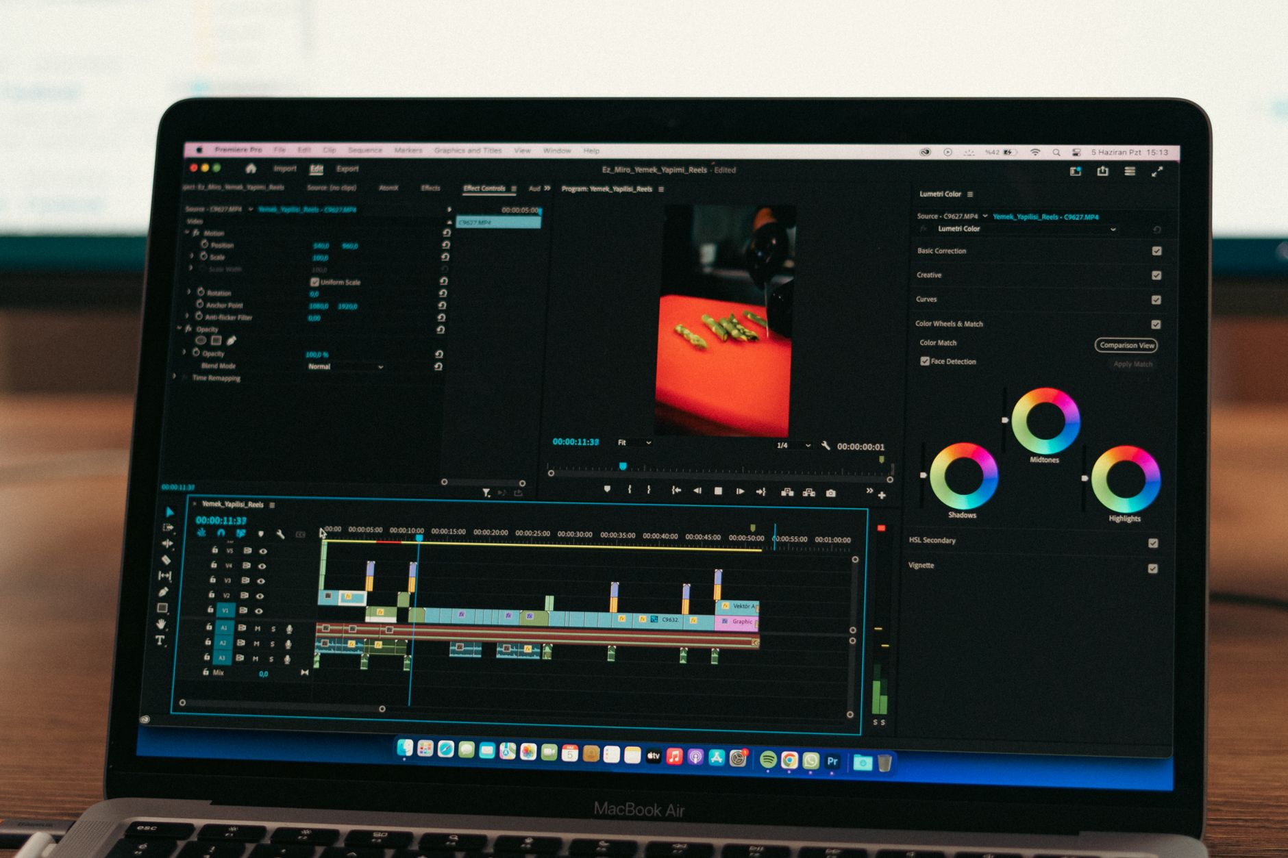 Laptop screen showing a colorful workflow diagram with connected nodes