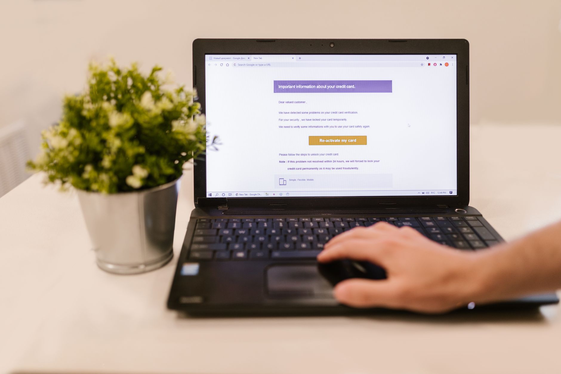 A freelancer typing a personalized outreach email on a laptop.
