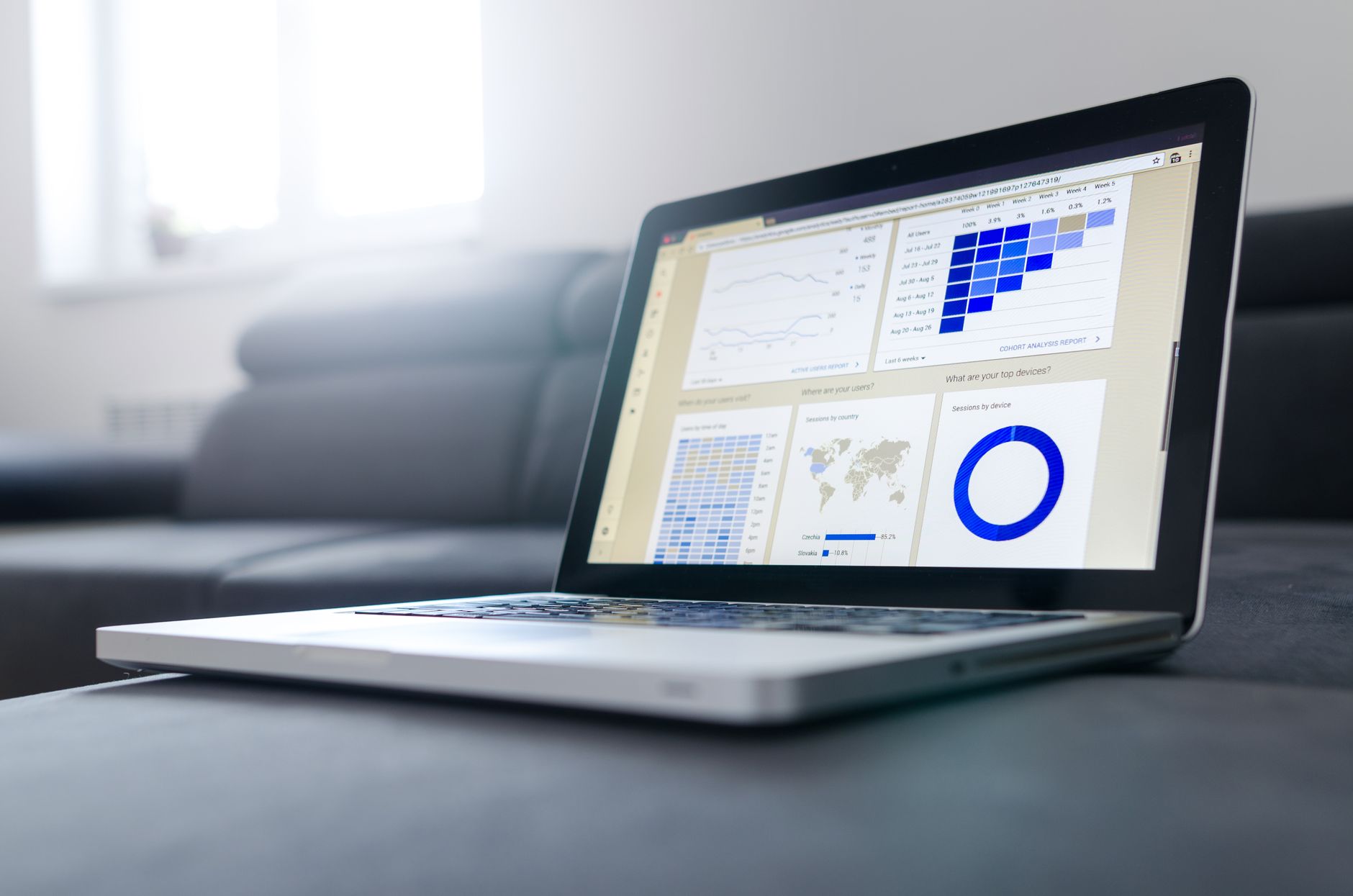 Laptop screen displaying a workflow automation dashboard with connected app icons.