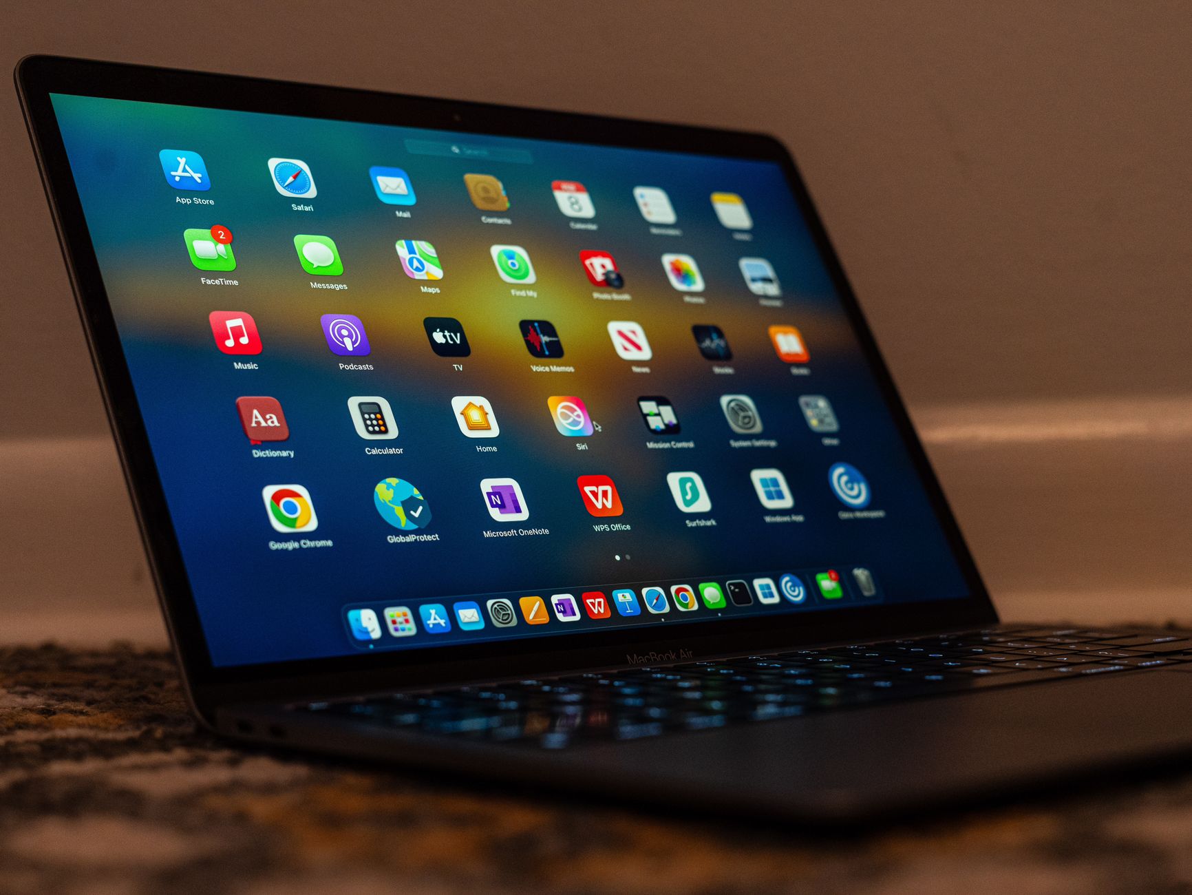 Laptop screen shows Zapier automation editor with app icons and fields.